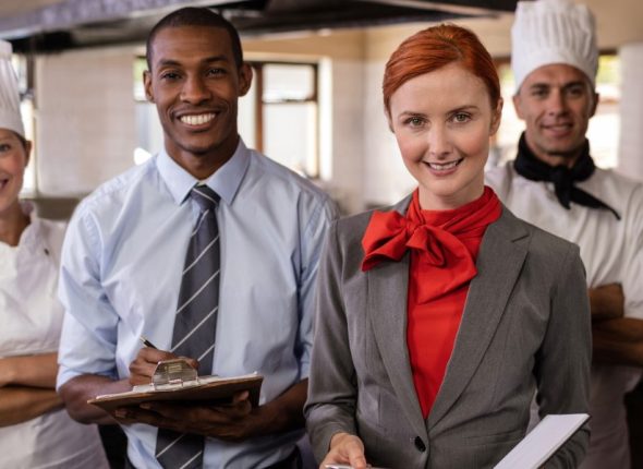 group-hotel-staffs-standing-kitchen